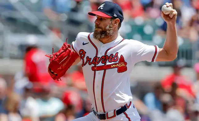 Atlanta Braves starting pitcher Chris Sale (51) delivers to a Philadelphia Phillies batter during the first inning of a baseball game, Sunday, April 26, 2026, in Atlanta. (AP Photo/Erik S. Lesser)