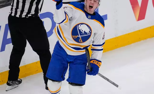 Buffalo Sabres center Noah Ostlund celebrates after his goal against the Boston Bruins during the third period in Game 3 of a first-round NHL hockey Stanley Cup playoff series, Thursday, April 23, 2026, in Boston. (AP Photo/Charles Krupa)