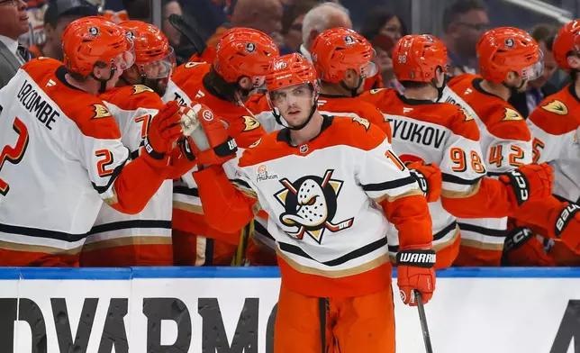 Anaheim Ducks' Troy Terry (19) celebrates a goal against the Edmonton Oilers during second period NHL playoff action in Edmonton on Monday, April 20, 2026. (Codie McLachlan/The Canadian Press via AP)