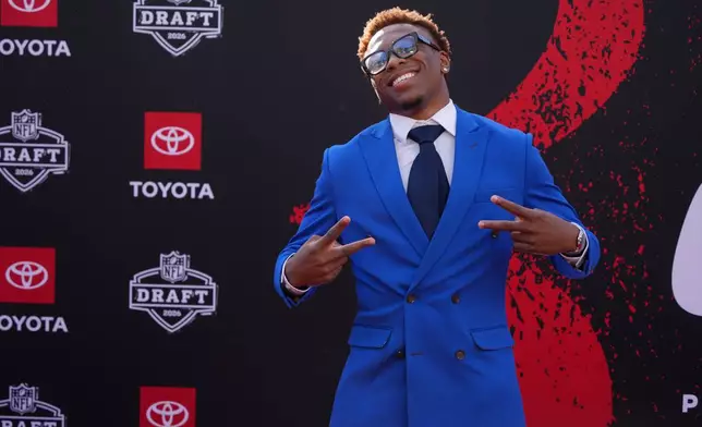 Tennessee defensive back Colton Hood poses on the red carpet before the first round of the NFL football draft, Thursday, April 23, 2026, in Pittsburgh. (AP Photo/Gene J. Puskar)