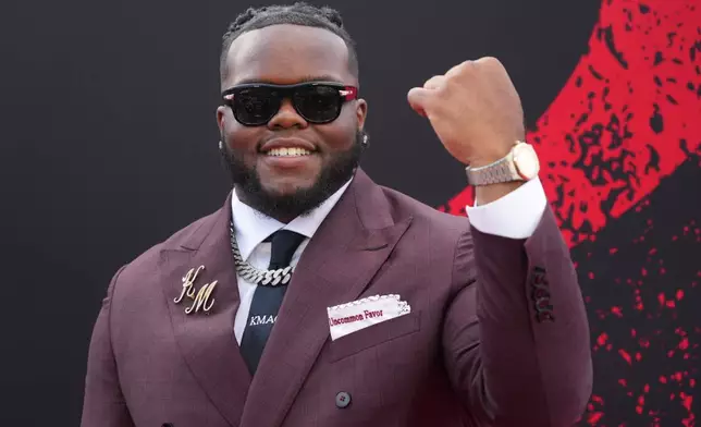 Ohio State defensive lineman Kayden McDonald poses on the red carpet before the first round of the NFL football draft, Thursday, April 23, 2026, in Pittsburgh. (AP Photo/Gene J. Puskar)
