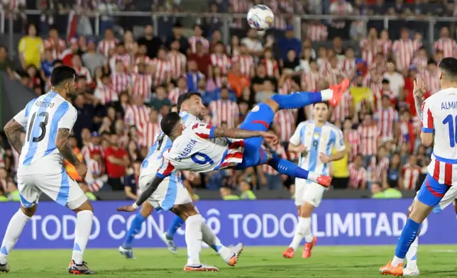 FILE - Paraguay's Antonio Sanabria scores his side's first goal against Argentina during a qualifying soccer match for the FIFA World Cup 2026 in Asuncion, Paraguay, Thursday, Nov. 14, 2024. (AP Photo/Marta Escurra, File)