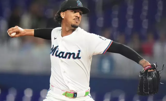 Miami Marlins starting pitcher Eury Perez throws during the first inning of a baseball game against the Cincinnati Reds, Wednesday, April 8, 2026, in Miami. (AP Photo/Lynne Sladky)