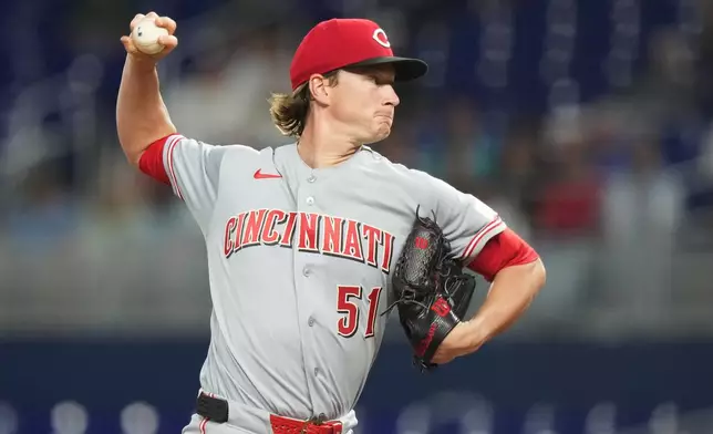 Cincinnati Reds pitcher Brady Singer (51) throws during the first inning of a baseball game against the Miami Marlins, Wednesday, April 8, 2026, in Miami. (AP Photo/Lynne Sladky)