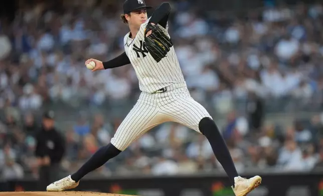New York Yankees' Cam Schlittler (31) pitches during the first inning of a baseball game against the Kansas City Royals Friday, April 17, 2026, in New York. (AP Photo/Frank Franklin II)