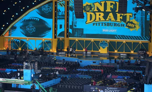 People rehearse ahead of the NFL football draft, Wednesday, April 22, 2026, in Pittsburgh. (AP Photo/Gene J. Puskar)