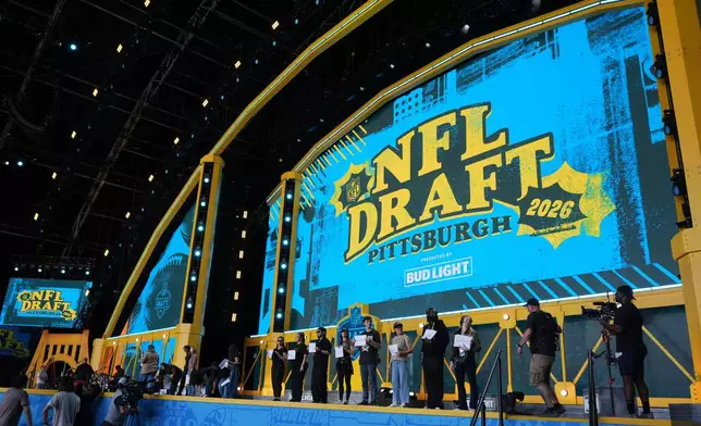People rehearse ahead of the NFL football draft, Wednesday, April 22, 2026, in Pittsburgh. (AP Photo/Gene J. Puskar)