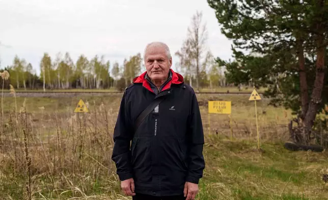 Viktor Hluhovtsov, 66, one of the workers sent to help clean up contamination from the Chernobyl nuclear power plant accident, poses for a portrait near the plant in Chernobyl, Ukraine, Tuesday, April 21, 2026. (AP Photo/Evgeniy Maloletka)