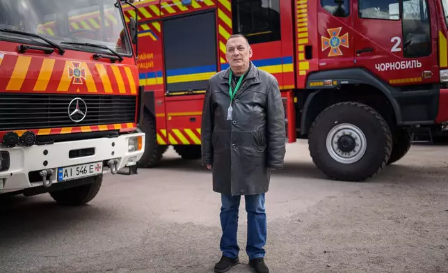 Stanislav Tolumnyi, 65, a firefighter who worked to decontaminate areas near the Chernobyl nuclear power plant after the 1986 accident, poses for a portrait, Tuesday, April 21, 2026, in Chernobyl, Ukraine, at a fire department where he served from 1987 to 1988. (AP Photo/Evgeniy Maloletka)