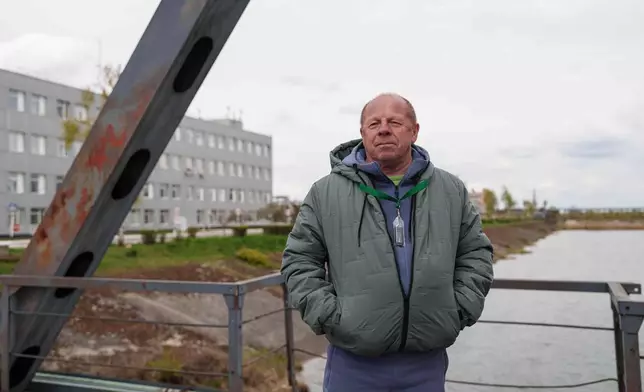 Anatolii Prylipko, 66, who drove a fire truck near the Chernobyl nuclear power plant after the 1986 accident, poses for a portrait near the plant in Chernobyl, Ukraine, Tuesday, April 21, 2026. (AP Photo/Evgeniy Maloletka)