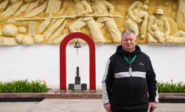 Mykola Chudak, 66, poses for a portrait at a fire department where he served for six months in 1986-87 working within 10 kilometers (6 miles) of the Chernobyl nuclear power plant in Chernobyl, Ukraine, Tuesday, April 21, 2026. (AP Photo/Evgeniy Maloletka)