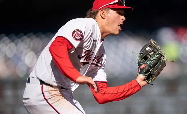 Washington Nationals third baseman Brady House fields a ground ball against St. Louis Cardinals in the second inning during a baseball game, Wednesday, April 8, 2026, in Washington. (AP Photo/Nathan Howard)