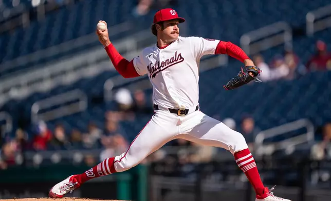 Washington Nationals pitcher Miles Mikolas pitches against the St. Louis Cardinals during the first inning of a baseball game, Wednesday, April 8, 2026, in Washington. (AP Photo/Nathan Howard)