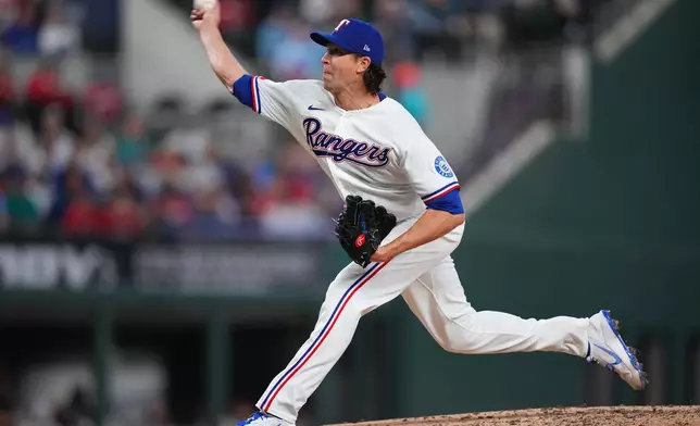 Texas Rangers starting pitcher Jacob deGrom throws a pitch to the Seattle Mariners during the fourth inning of a baseball game Monday, April 6, 2026, in Arlington, Texas. (AP Photo/Julio Cortez)