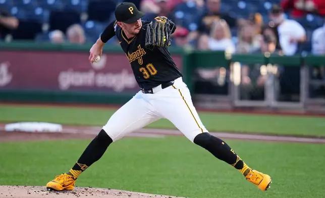 Pittsburgh Pirates pitcher Paul Skenes delivers during the first inning of a baseball game against the Washington Nationals in Pittsburgh, Monday, April 13, 2026. (AP Photo/Gene J. Puskar)