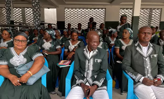 Kimbanguist Church members attend Easter Sunday service at a reception center for the faithful in Kinshasa, Democratic Republic of the Congo, Sunday, April 5, 2026. (AP Photo/Rodney Muhumuza)