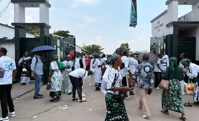 Kimbanguist Church members gather for Easter Sunday service at a reception center for the faithful in Kinshasa, Democratic Republic of the Congo, Sunday, April 5, 2026. (AP Photo/Rodney Muhumuza)