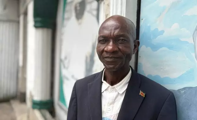 Toussaint Mungwala, a Kimbanguist pastor from the province of Kuilu, poses at a reception center for the faithful in Kinshasa, Democratic Republic of the Congo, Sunday, April 5, 2026. (AP Photo/Rodney Muhumuza)