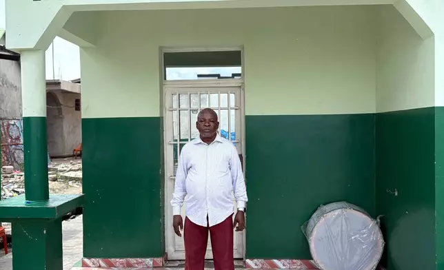 Andre Kibangudi, a Kimbanguist Church leader, poses at a reception center for the faithful in Kinshasa, Democratic Republic of the Congo, Sunday, April 5, 2026. (AP Photo/Rodney Muhumuza)