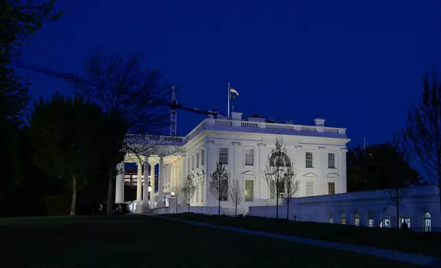 The White House is seen in Washington, Tuesday, April 7, 2026, at 8:00 p.m. EDT. (AP Photo/Rod Lamkey, Jr.)