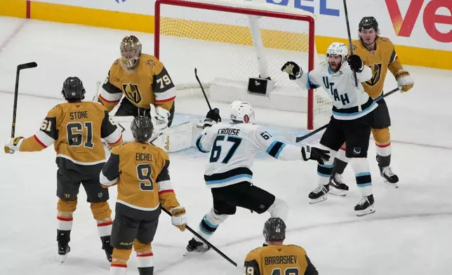 Utah Mammoth left wing Lawson Crouse (67) celebrates after scoring against Vegas Golden Knights goaltender Carter Hart (79) during the second period of Game 5 of a first-round NHL hockey Stanley Cup playoff series Wednesday, April 29, 2026, in Las Vegas. (AP Photo/John Locher)