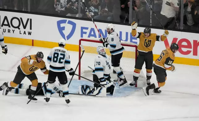 Vegas Golden Knights right wing Pavel Dorofeyev (16) celebrates after scoring against Utah Mammoth goaltender Karel Vejmelka (70) during the third period of Game 5 of a first-round NHL hockey Stanley Cup playoff series Wednesday, April 29, 2026, in Las Vegas. (AP Photo/John Locher)