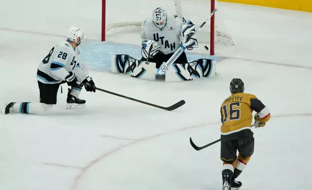 Vegas Golden Knights right wing Pavel Dorofeyev (16) scores against Utah Mammoth goaltender Karel Vejmelka (70) during the first period of Game 5 of a first-round NHL hockey Stanley Cup playoff series Wednesday, April 29, 2026, in Las Vegas. (AP Photo/John Locher)