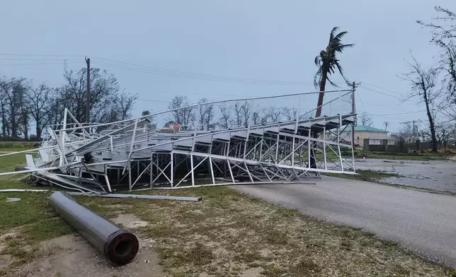 Debris covers the ground in Saipan on Wednesday, April 15, 2026, as a super typhoon with ferocious winds and relentless rains, shredded tin roofs and forced residents to take cover from flying tree limbs. (Office of the Mayor, municipality of Saipan via AP)
