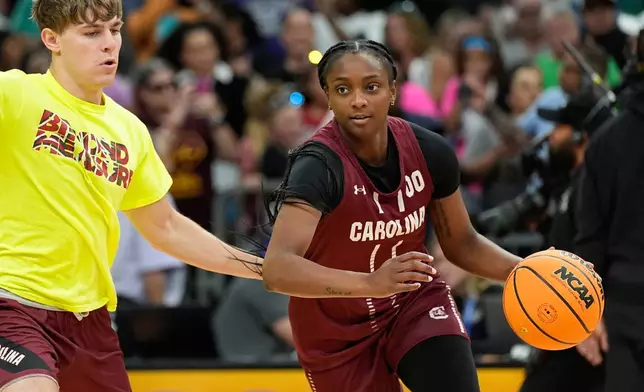 South Carolina guard Ta'niya Latson (00) drives during a practice at the NCAA college basketball tournament Final Four, Saturday, April 4, 2026, in Phoenix. (AP Photo/John Locher)