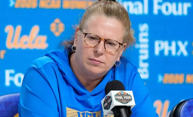 UCLA head coach Cori Close speaks during a news conference at the NCAA college basketball tournament Final Four, Saturday, April 4, 2026, in Phoenix. (AP Photo/John Locher)