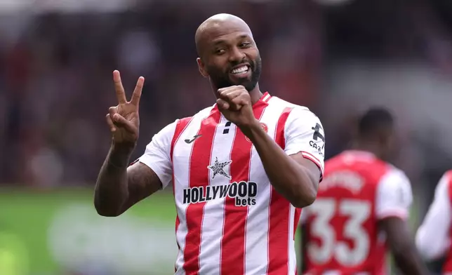 Brentford's Igor Thiago celebrates scoring his side's first goal from the penalty spot during the English Premier League match between Brentford and Everton, at the Gtech Community Stadium, London, Saturday April 11, 2026. (Steven Paston/PA via AP)