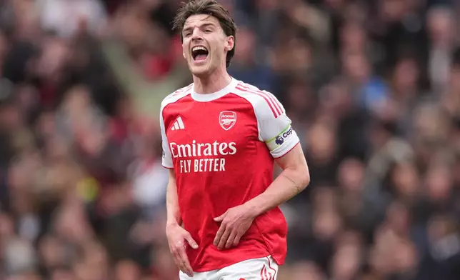 Arsenal's Declan Rice reacts during the Premier League soccer match between Arsenal and Bournemouth in London, England Saturday, April 11, 2026. (AP Photo/Dave Shopland)