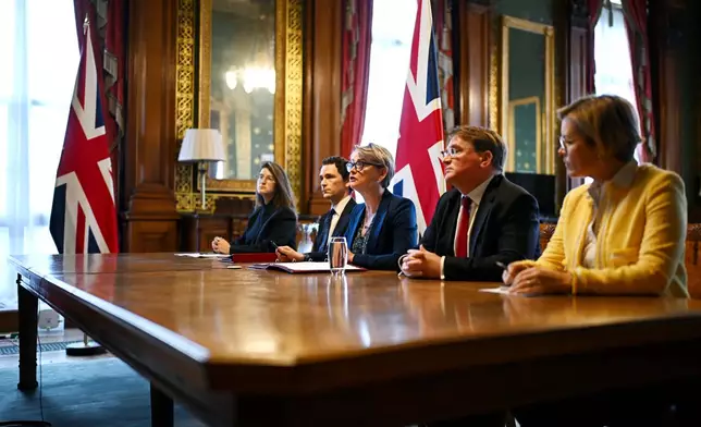 Britain's Foreign Secretary Yvette Cooper, center, speaks during a virtual summit at the Foreign &amp; Commonwealth Office in London, on Thursday April 2, 2026, with around 35 countries to discuss ways of reopening the Strait of Hormuz. (Leon Neal/Pool Photo via AP)