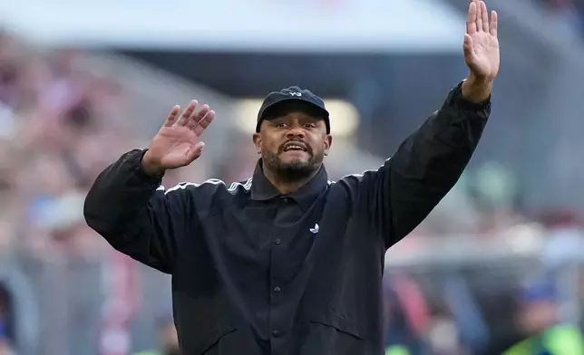 Bayern's head coach Vincent Kompany reacts during a Bundesliga soccer match between Bayern and Stuttgart in Munich, Germany, Sunday, April 19, 2026. (AP Photo/Matthias Schrader)