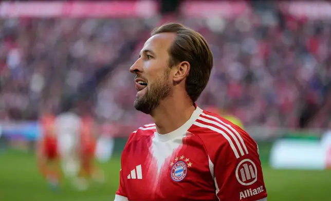 Bayern's Harry Kane reacts during a Bundesliga soccer match between Bayern and Stuttgart in Munich, Germany, Sunday, April 19, 2026. (AP Photo/Matthias Schrader)