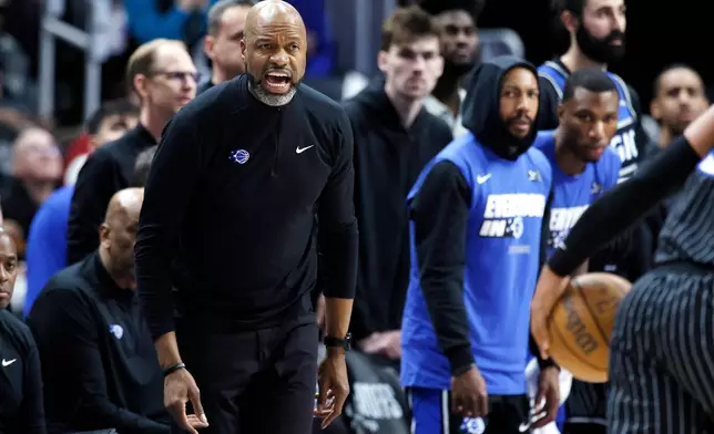 Orlando Magic head coach Jamahl Mosley shouts at his team during the first half in Game 1 of a first-round NBA basketball playoffs series against the Detroit Pistons Sunday, April 19, 2026, in Detroit. (AP Photo/Duane Burleson)