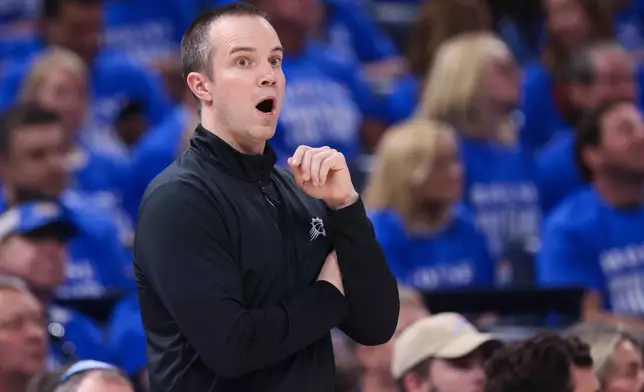 Phoenix Suns head coach Jordan Ott gives instructions during the second half in Game 1 of a first-round NBA playoffs basketball series against the Oklahoma City Thunder, Sunday, April 19, 2026, in Oklahoma City. (AP Photo/Nate Billings)