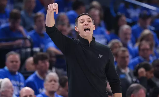 Oklahoma City Thunder head coach Mark Daigneault gives instructions to his team during the first half in Game 1 of a first-round NBA playoffs basketball series against the Phoenix Suns, Sunday, April 19, 2026, in Oklahoma City. (AP Photo/Nate Billings)