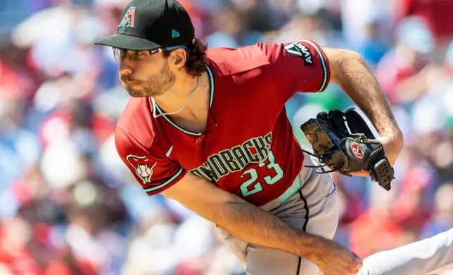 Arizona Diamondbacks starting pitcher Zac Gallen throws in the first inning of a baseball game against the Philadelphia Phillies, Sunday, April 12, 2026, in Philadelphia. (AP Photo/Laurence Kesterson)