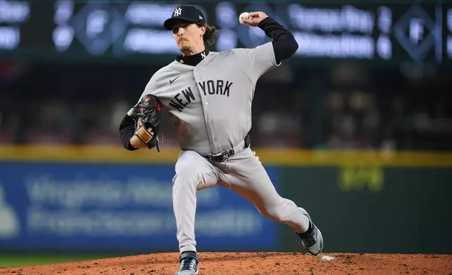 New York Yankees starting pitcher Max Fried throws against the Seattle Mariners during the fourth inning of a baseball game, Tuesday, March 31, 2026, in Seattle. (AP Photo/Lindsey Wasson)