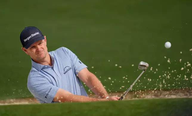 Justin Rose, of England, hits from the bunker on the second hole during a practice round at of the Masters golf tournament at the Augusta National Golf Club, Monday, April 6, 2026, in Augusta, Ga. (AP Photo/Ashley Landis)