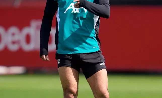 Liverpool's Mohamed Salah attends a training session in Liverpool, England, Tuesday April 7, 2026. (Peter Byrne/PA via AP)