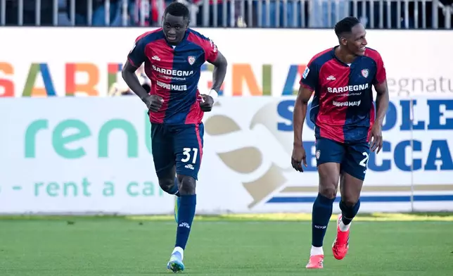 Cagliari's Paul Mendy celebrates after scoring during the Serie A soccer match between Cagliari and Atalanta, in Cagliari, Italy, Monday, April 27. (Gianluca Zuddas/LaPresse via AP)