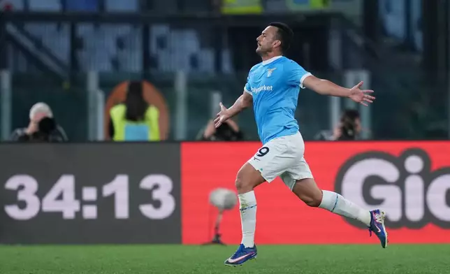 Lazio's Pedro celebrates scoring during the Serie A soccer match between Lazio and Udinese in Rome, Italy, Monday April 27, 2026. (Alfredo Falcone/LaPresse via AP)