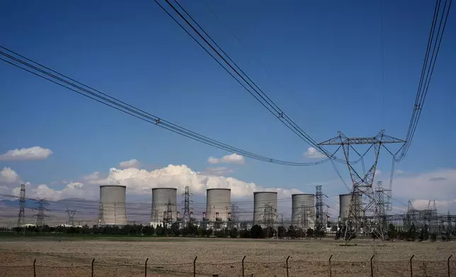 The Damavand power station is seen from a nearby road on the outskirts of Tehran, Iran, Tuesday, April 7, 2026. (AP Photo/Francisco Seco)