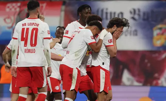 RB Leipzig's Max Finkgräfe celebrates after scoring a goal during a Bundesliga soccer match between RB Leipzig and 1. FC Union Berlin, Friday, April 24, 2026, in Leipzig, Germany. (Jan Woitas/dpa via AP)