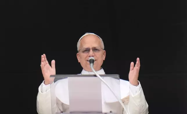 Pope Leo XIV delivers the Regina Coeli prayer in St. Peter's Square at the Vatican, Sunday, April 12, 2026. (AP Photo/Gregorio Borgia)