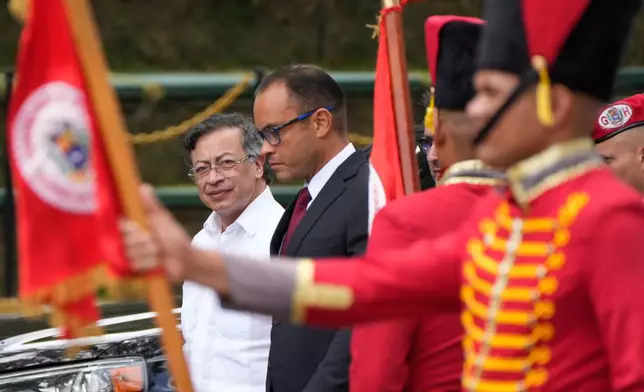 Colombian President Gustavo Petro arrives to meet Venezuela's acting President Delcy Rodriguez at Miraflores Palace in Caracas, Venezuela, Friday, April 24, 2026. (AP Photo/Ariana Cubillos)