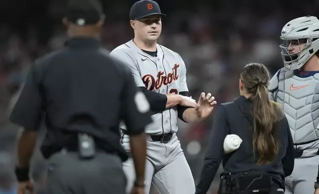 Detroit Tigers pitcher Tarik Skubal (29) rubs his arm during the seventh inning of a baseball game against the Atlanta Braves Wednesday, Apr. 29, 2026, in Atlanta. (AP Photo/Brynn Anderson)