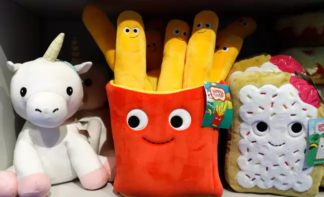 FILE - Plush toys are displayed at a Camp store in New York. Camp, Nov. 21, 2019. (AP Photo/Mark Lennihan, File)